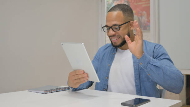 istock African Businessman Working on Documents in Office 1831256702
