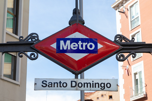 Santo Domingo metro station sign in the street of Madrid, Spain