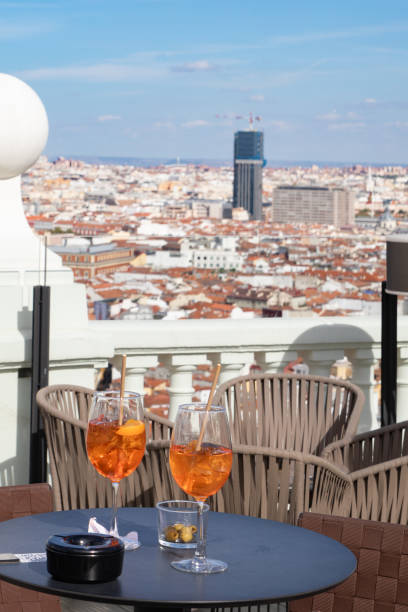 istock Cocktail drinks on a  rooftop restaurant with a city view 1831259301