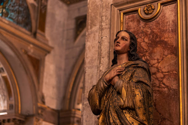 istock santiago - chile. classical statue of virgin mary praying 1831269838