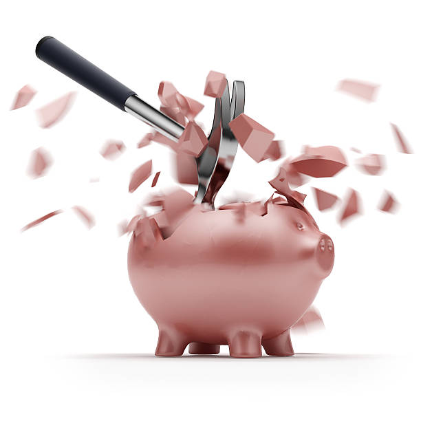 istock Broken Piggy Bank with hammer 183132220