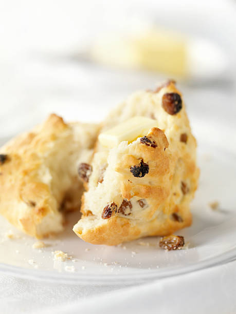 istock Fresh Baked Raisin Scones with Melting Butter 183137354