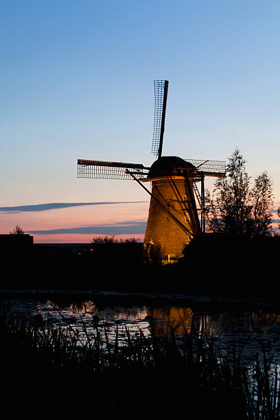 istock Holland by night. Dutch landscape with windmills. 183137746