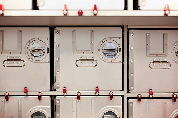 A flat look at a well lit stack of open empty yellow lockers in a school hallway - 3D render