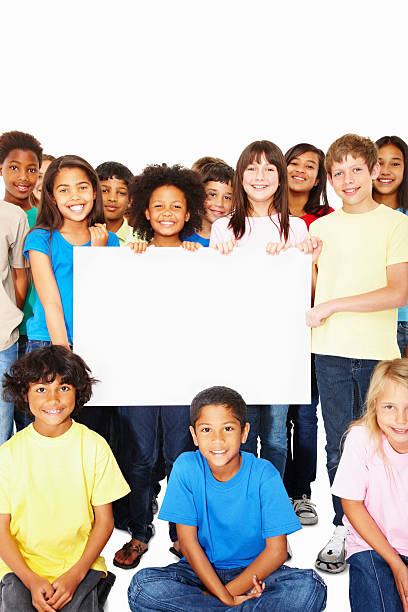 istock Happy boys and girls with billboard - copyspace 183138097