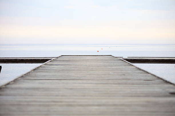 istock old wooden pier at the sea 183138804