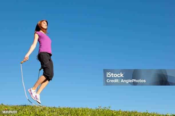 Young Woman Jumping Rope Stock Photo - Download Image Now - 20-24 Years, Active Lifestyle, Adult