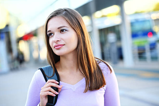 istock Girl at bus station 183139625