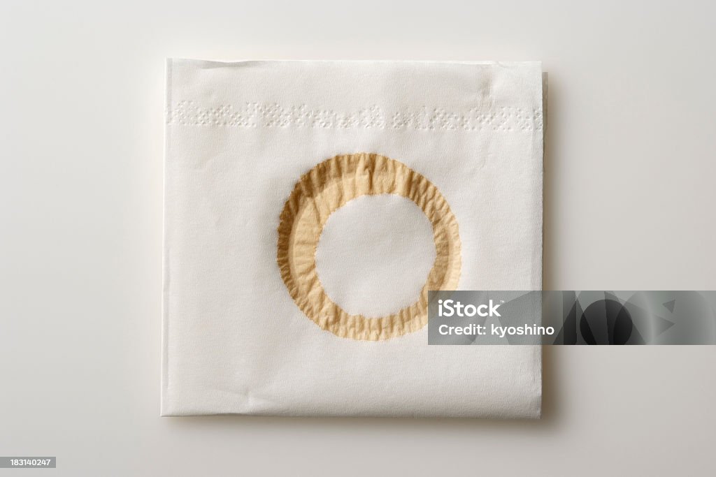Aislado fotografía de servilleta con manchas de café sobre fondo blanco - Foto de stock de Con manchas libre de derechos