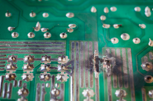 Macro shot of a shorted out circuit board.Similar images: