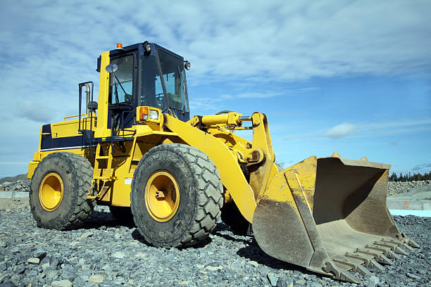 istock Close-up of a yellow payload we out on a sunny day 183140465
