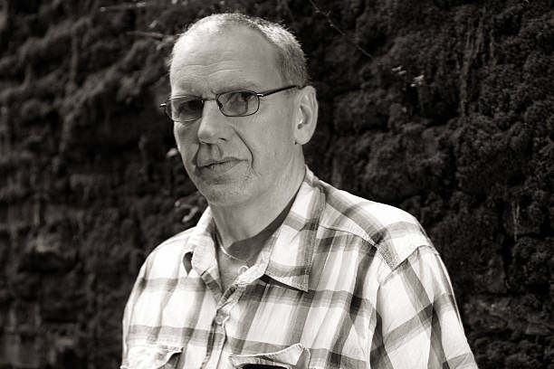 istock Mature man in check shirt portrait 183140645