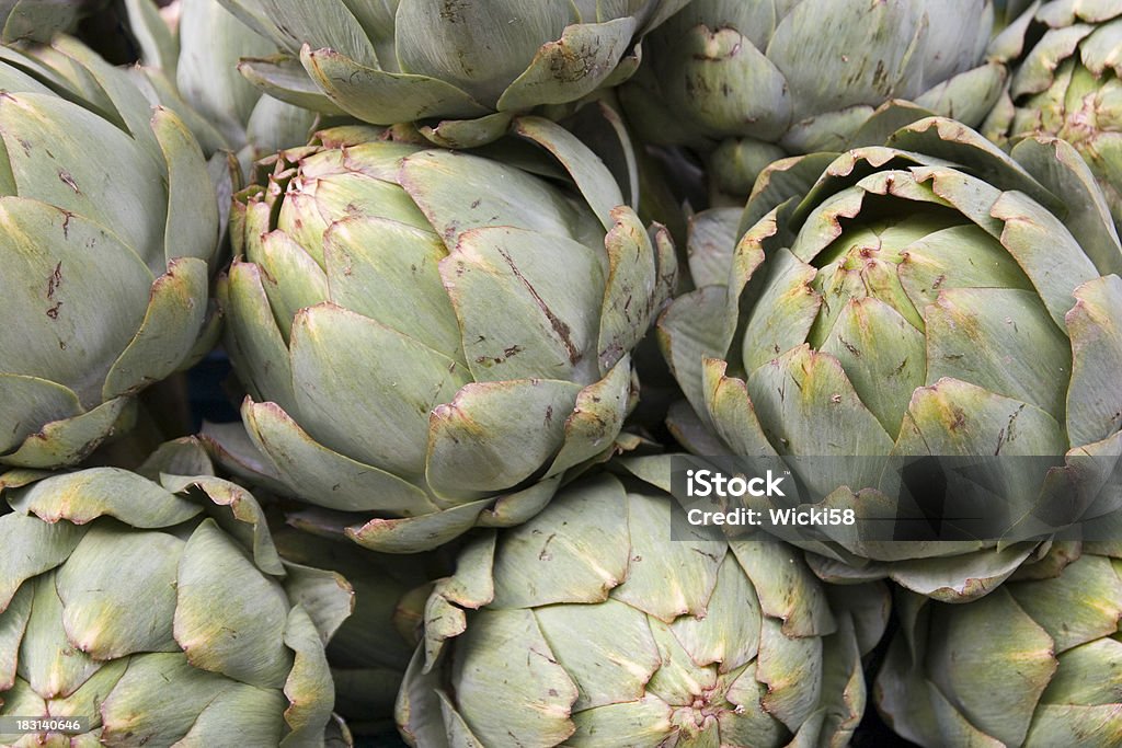 Artichokes Pile of fresh artichokes on a farmers market Antioxidant Stock Photo