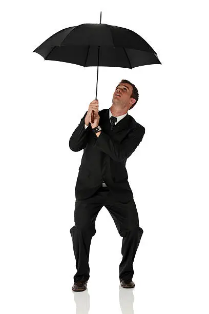 Photo of Businessman under an umbrella