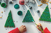 Child coloring pasta creativity, Christmas activity idea