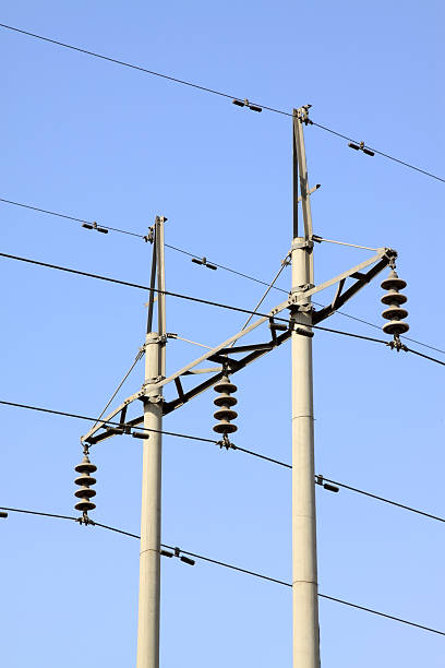 istock electric wire pole in the blue sky 183145866