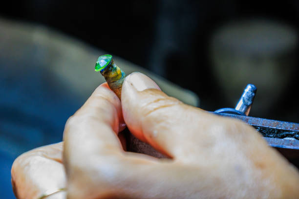 istock Jeweler cutting gemstones, gem cutting tools 1831465325