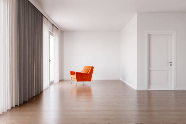 istock Orange chair in empty living room 1831506074