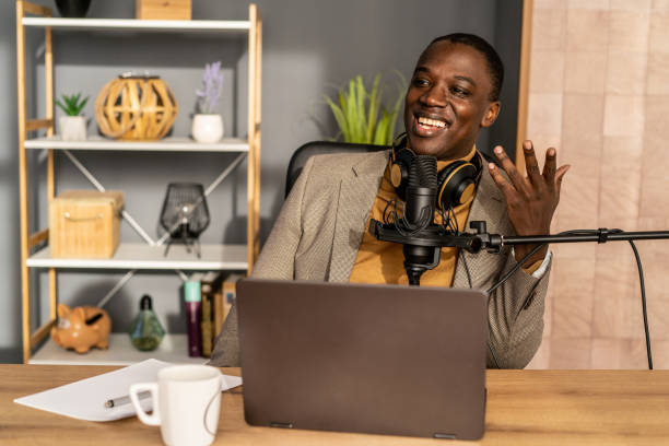 istock A male radio host is broadcasting in a studio using microphone and headphones 1831512445