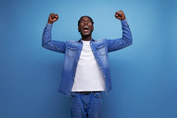 istock happy american man with dreadlocks in casual denim jacket 1831519905