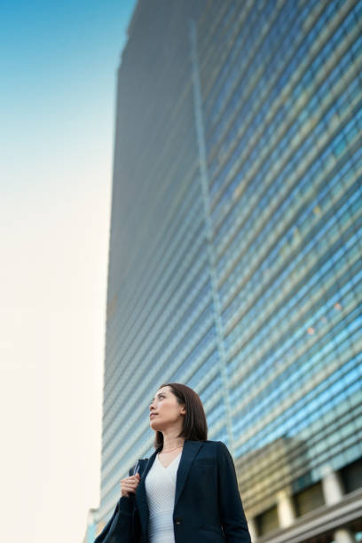 istock Business woman looking up at the sky 1831521906