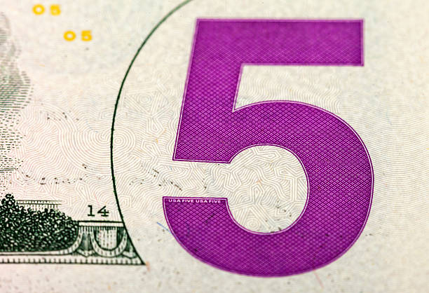 istock Fragment of five dollar bill close up 183152227