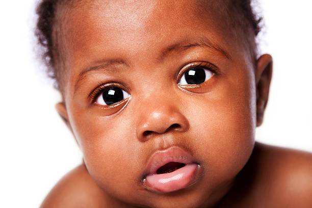istock Innocent African baby face 183155219