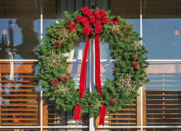 istock close up on Christmas wreath on the window 1831584627