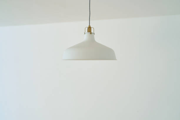istock white light fixtures and white walls 1831585661