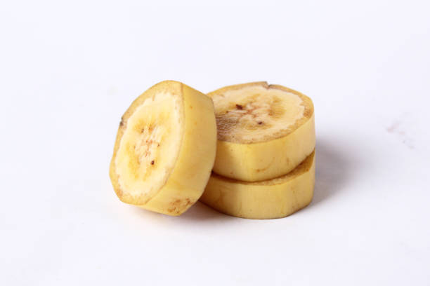 istock fresh sliced banana fruit with peel, isolated background 1831587763