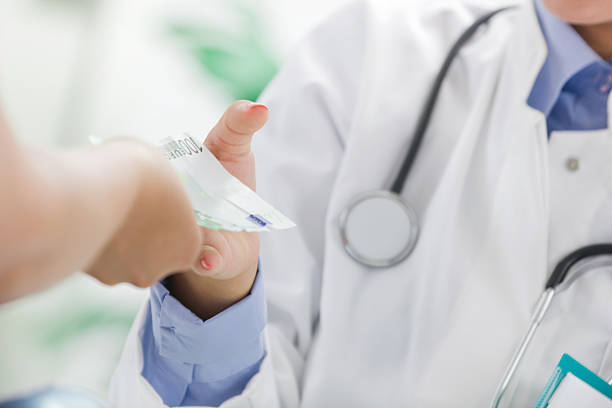 istock Doctor receiving a bribe 183160352