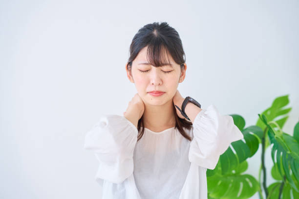 istock young woman suffering from stiff shoulders 1831611521