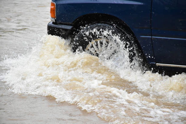 istock Cars with floodwater 1831670071
