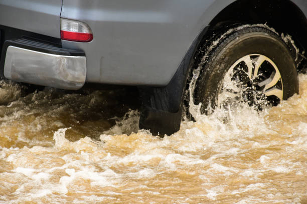 istock Cars with floodwater 1831670628