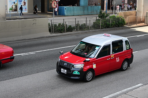 taxi in early morning bumper to bumper traffic in the city