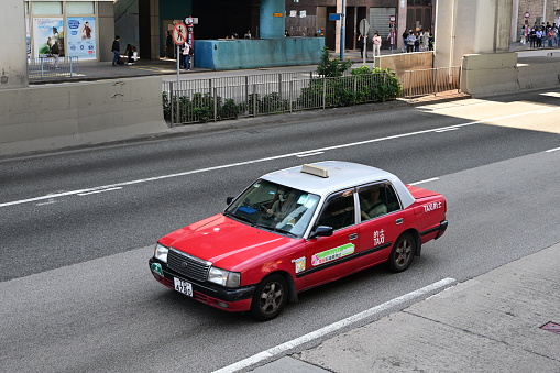 Taxi in Kwun Tong district, Hong Kong - 11/27/2023 13:47:01 +0000.