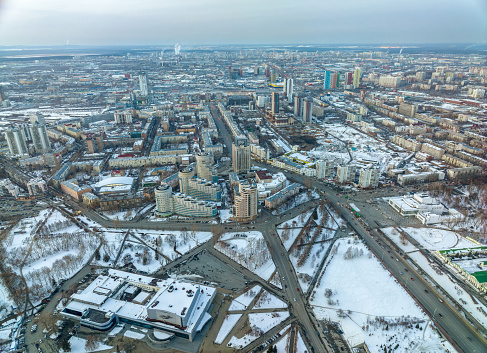 Yekaterinburg aerial panoramic view in Winter at sunset. Ekaterinburg is the fourth largest city in Russia located in the Eurasian continent on the border of Europe and Asia. Yekaterinburg, Russia