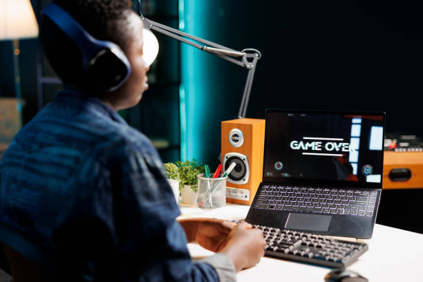 istock Female looking at game over on screen 1831735431