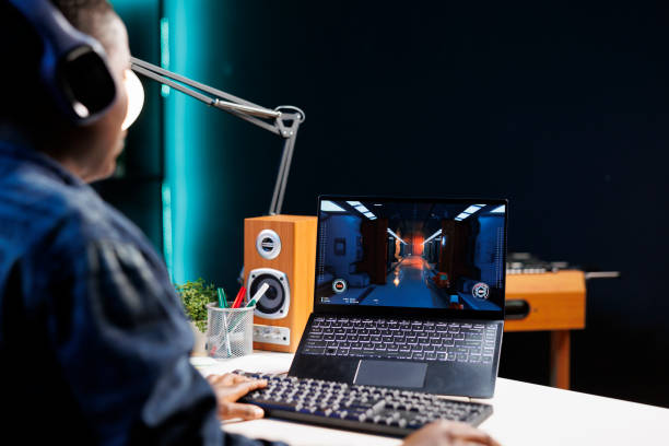 istock Female player gaming on digital laptop 1831735600