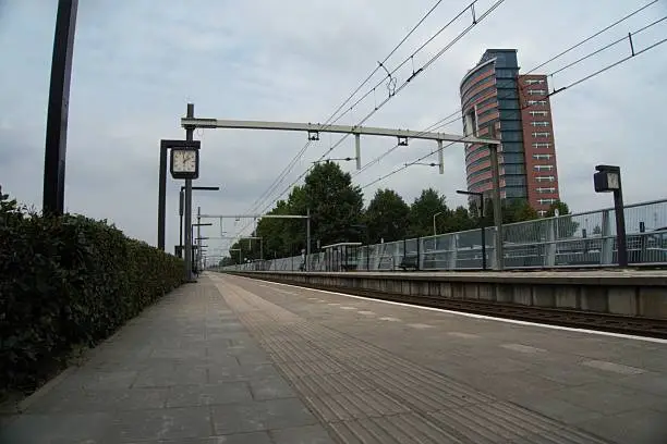 Regular trainstation in The Netherlands with building