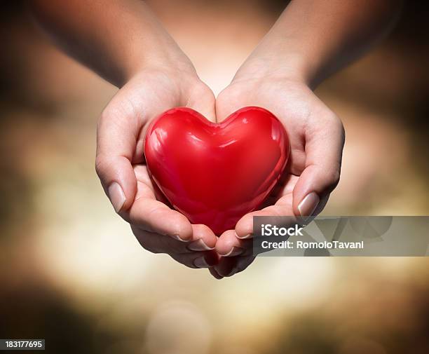 Donation Of Life Red Heart Stock Photo - Download Image Now - Heart Shape, Blood Donation, Human Hand