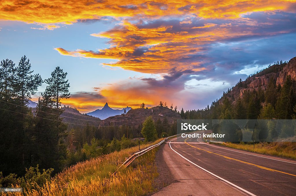 Stormy sky at Sunset Dramatic Stormy Sky over Road 212 toward Yellowstone Backgrounds Stock Photo