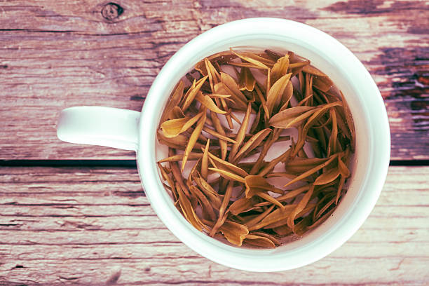 istock green tea in white china cup 183180569
