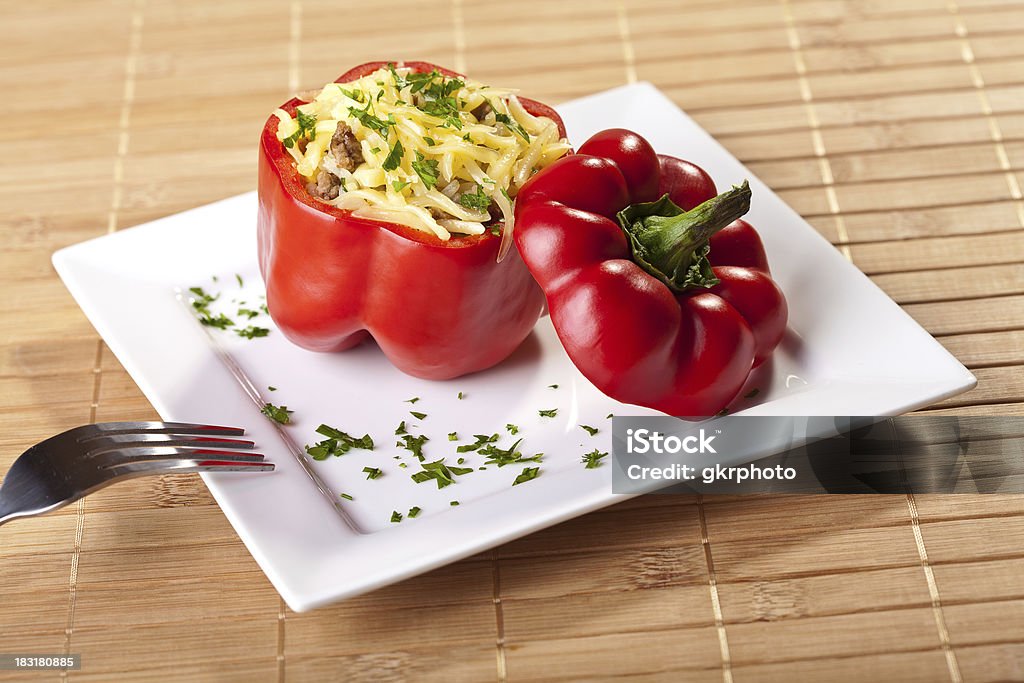 Stuffed peppers Stuffed peppers roasted with cheese Appetizer Stock Photo
