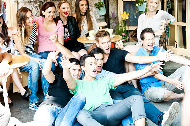istock Group of happy young friends 183181042