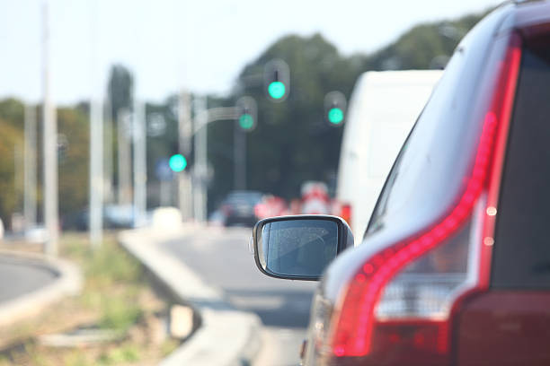 istock car within traffic jam in rush hour highway city 183181069