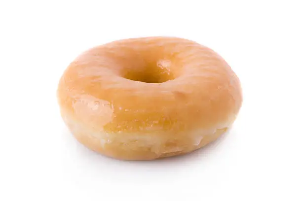 sugar glazed doughnut or donut isolated on white background