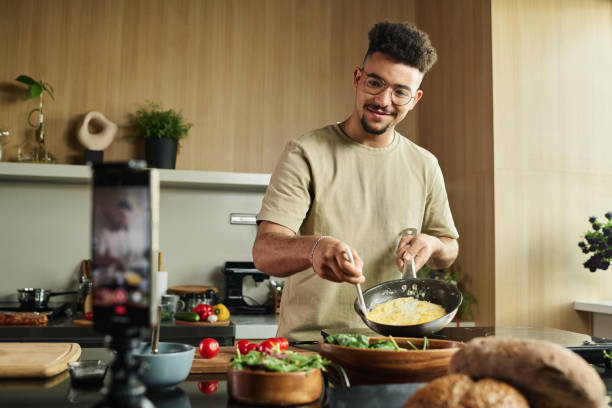 istock Food Blogger Showing His Work on Camera 1831820687
