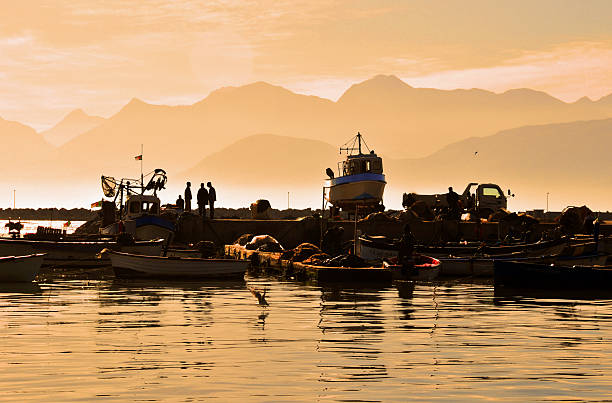 Bejaia, Algeria: fishing harbour Algeria,Béjaïa, Kabylia, Algeria: Mediterranean fishing harbour with the Babor mountains in the background - photo by M.Torres kabylie stock pictures, royalty-free photos & images