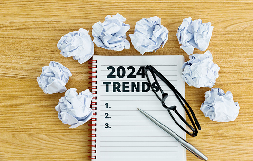 2024 trends written on notebook